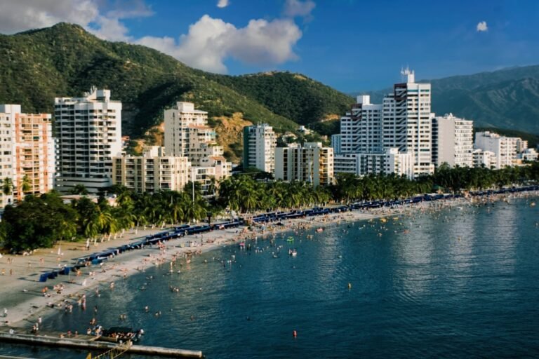 View of Santa Marta, Colombia coast backdropped by rolling hills