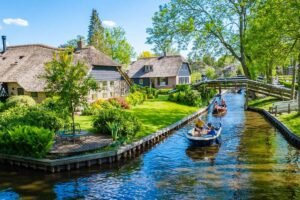 Charming Canal In Giethoorn, The Netherlands