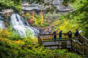 People observing waterfall at Blackwater Falls State Park