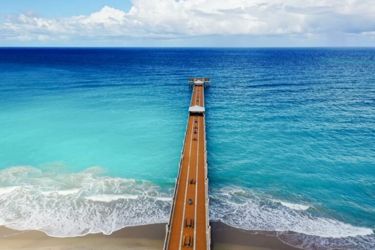 Pier and lifeguard stand at Juno Beach, Florida USA